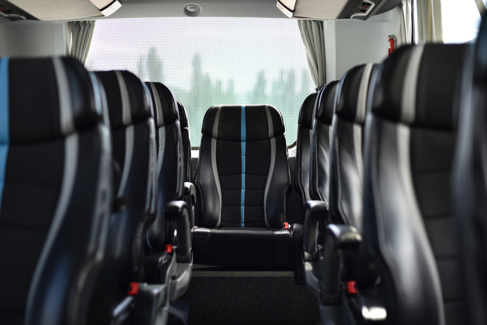 leather seats in a charter bus rental